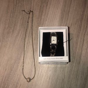 Silver necklace and watch